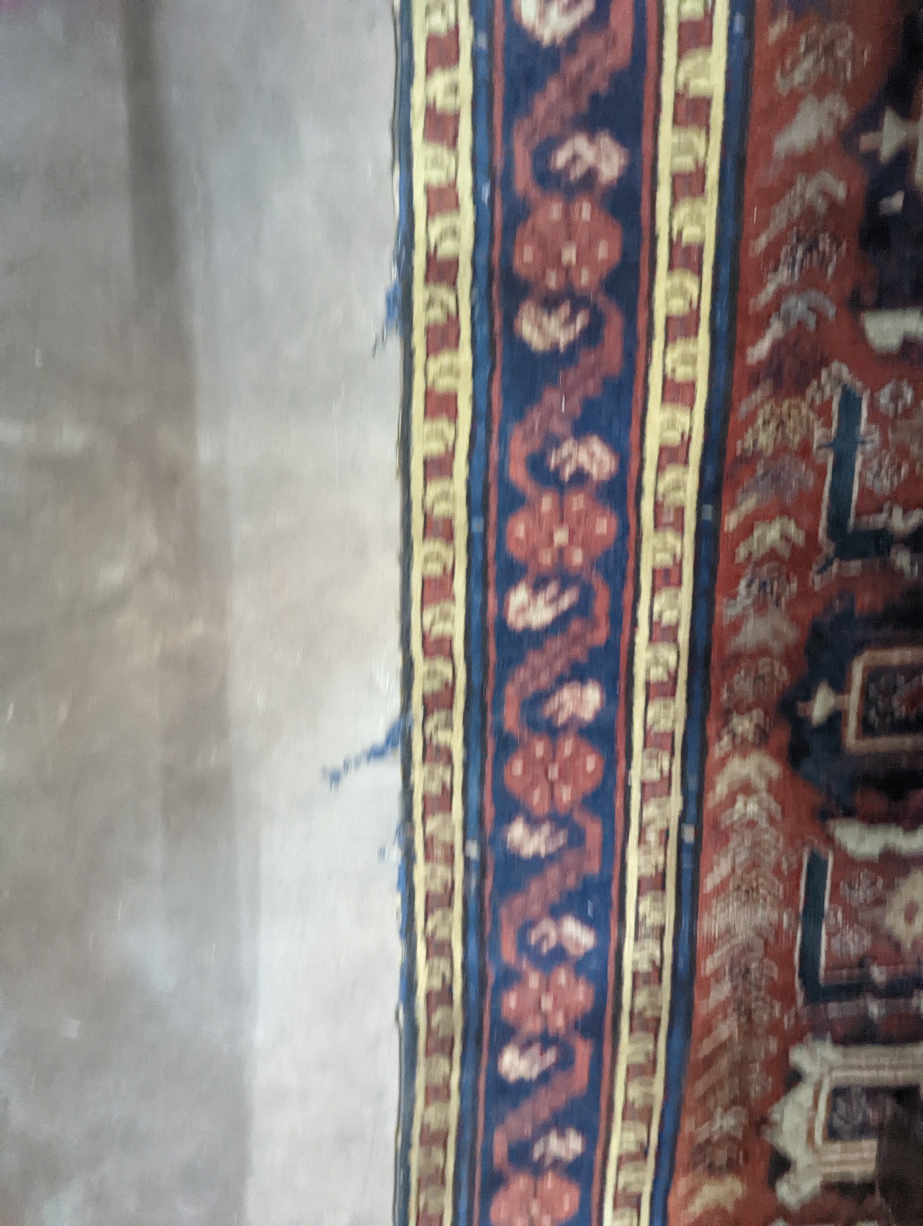 A Caucasian design brick red ground runner, 430 x 80cm